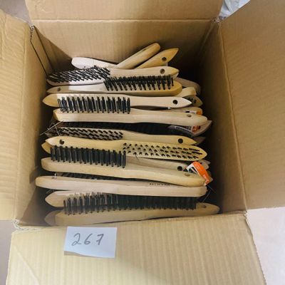 a lot of brushes in a box with a price tag