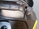 an image of a car washer with a hose attached to the side of it