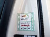 a sticker on the door of a vehicle that says e v tachy