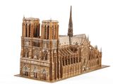 a wooden model of a cathedral on a white surface