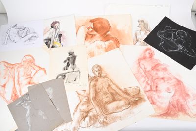 many drawings of a woman sitting on a table