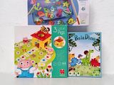 three children ' s books that are on the table