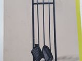 a picture of a set of four pieces of fireplace tools
