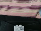 a close up of a pair of pants with a price tag on them