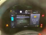 the dashboard of a car with a digital display on it