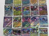 a close up of a bunch of pokemon cards on a table