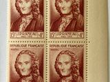 four stamps of the four presidents of france on a piece of paper