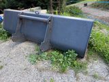 a large piece of metal that is sitting on the ground