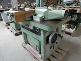a machine that is sitting on a pallet in a warehouse