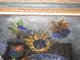 a painting of sunflowers in a vase on a table