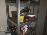 a shelf with various items on it in a room