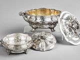 three silverplated dishes and a bowl on a stand