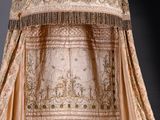 a bed that has a canopy over it