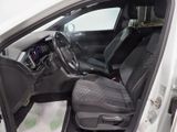 the interior of a car with the door open and the driver ' s seat up