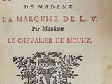 an old book with a black and red title on it