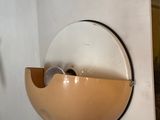 a picture of a wall mounted light fixture with a bowl on it