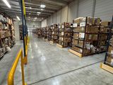 a large warehouse filled with lots of boxes and pallets