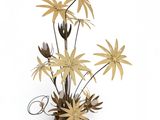 a vase with a bunch of flowers in it on a white surface