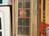 a picture of a picture of a woman in a window in a box