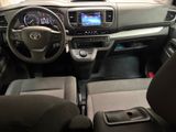 a picture of the interior of a car with a steering wheel and dashboard