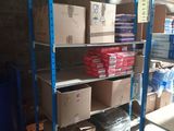 many boxes and boxes on the shelves in the warehouse