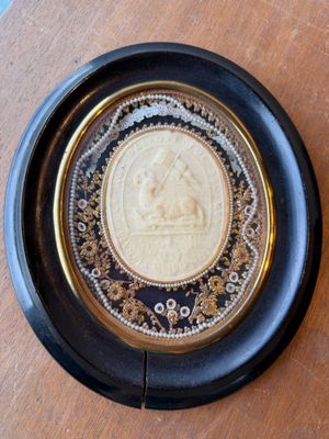 a plate that has a picture of a man on it