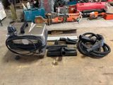 a lot of tools that are sitting on the floor