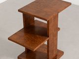 an image of a wooden table with three shelves on it