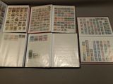many different types of stamps on the pages of a book