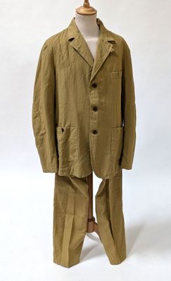 an image of a suit on a mannequin stand