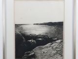 an image of a black and white photo of a rocky beach