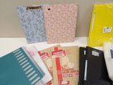 many different types of binders on the table