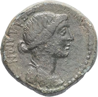 une pièce d'argent portant une tête de femme et une couronne