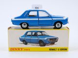 a blue toy car sitting on top of a box