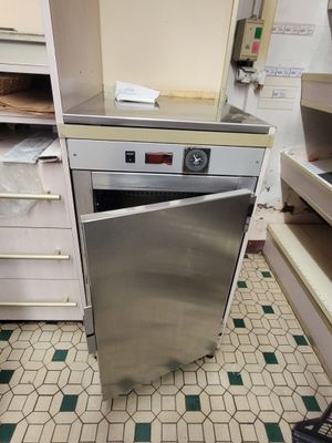 an image of a kitchen with a stove and a dishwasher