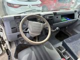 a car dashboard with a steering wheel and a dash board