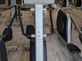 a gym machine in the middle of the floor
