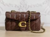 brown quilted purse with gold hardware and chain strap