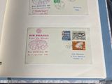 a book with stamps on it sitting on a table