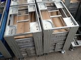 a lot of metal boxes stacked on top of each other