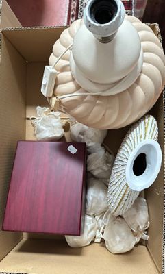 a box full of items that are sitting on the floor