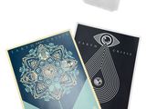 two cards with a picture of a flower on them and a sticker with a picture of a flower on it