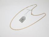 a gold chain with a tag on it and a tag attached to it