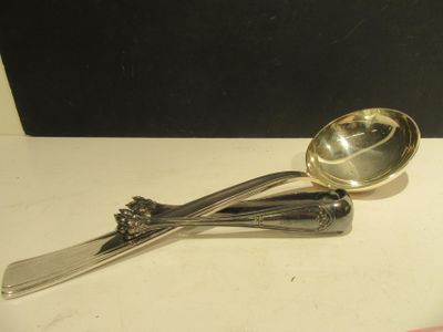 two spoons and a spoon on a table