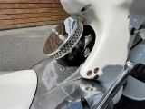 a close up of a motorcycle with a helmet on it