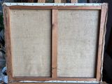 an old wooden easel with a piece of fabric on top of it