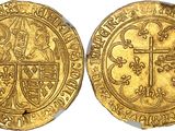 a gold coin with a cross on the front and a shield on the back