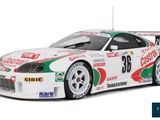 the car is white and green with a red and white stripe