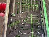 a lot of tools that are sitting on a table
