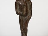 bronze statue of a man holding a baby in his arms